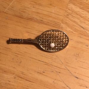 Golden tennis racket pin. Vintage